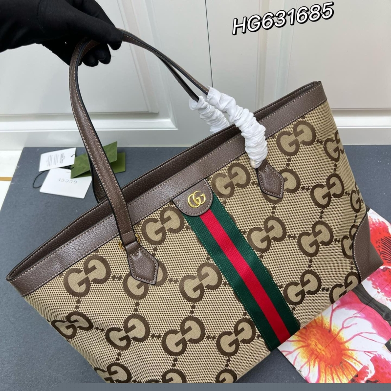 G*u*i shopping bags